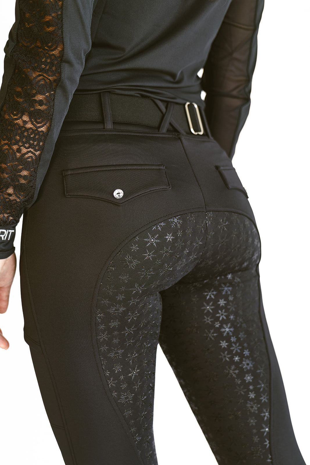 Black fleece-lined winter riding tights, back view showing limited edition snowflake silicone full seat grip